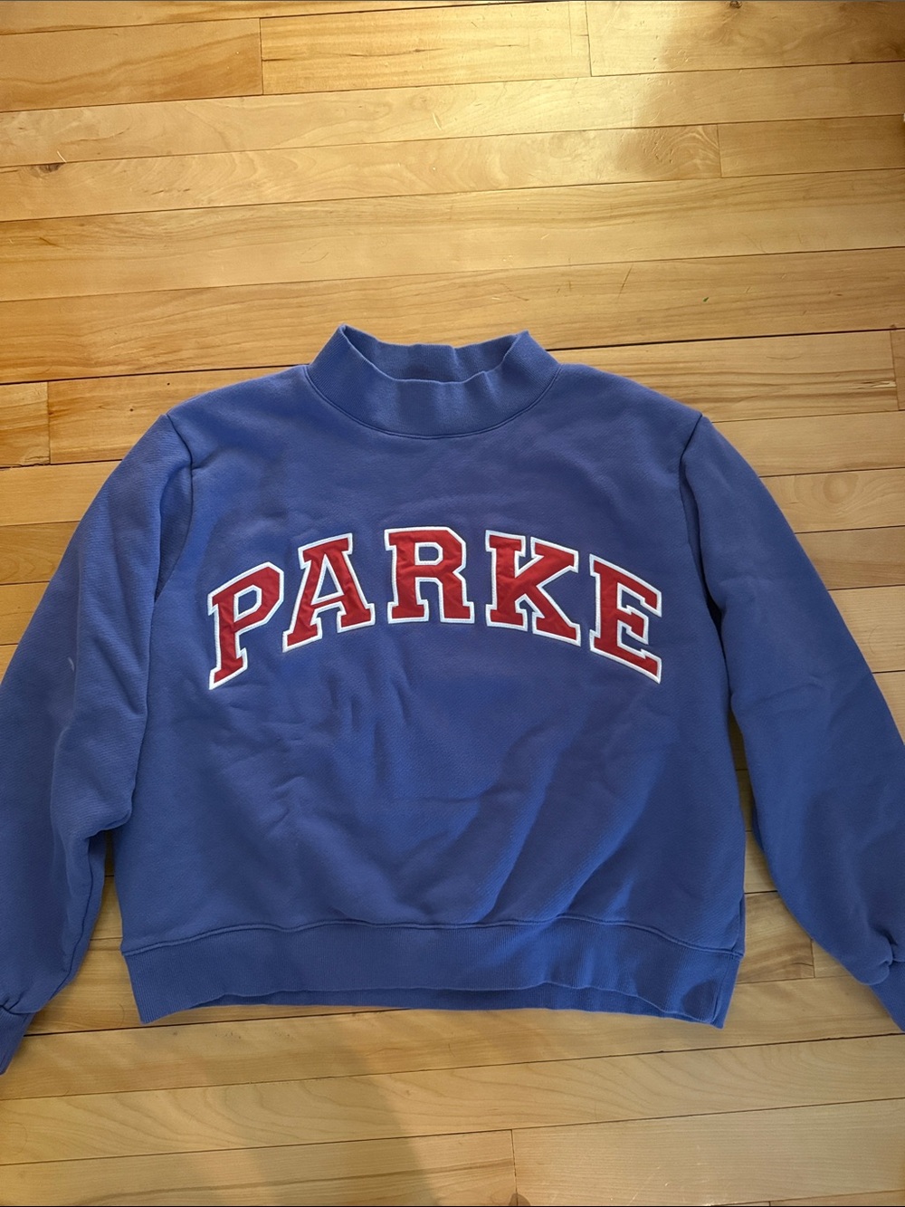 Parke Women's Purple Mock Neck Sweatshirt with Red Logo